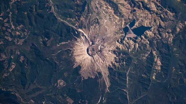 Vertical rotating sunset timelapse over Mount St Helens Washington volcano satellite view from space based on Nasa imagery
