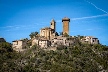 Fototapeta premium View of the medieval village of Abizanda, Huesca, Aragon, Spain, with its church and tower on a hill