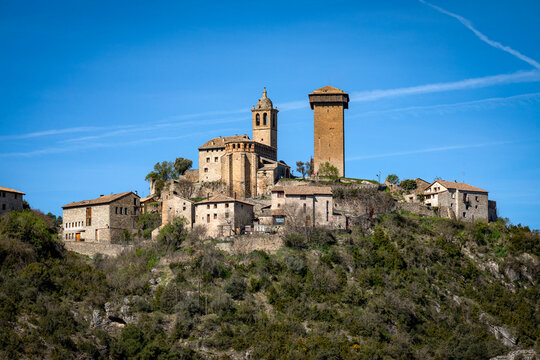 View of the medieval village of Abizanda, Huesca, Aragon, Spain, with its church and tower on a hill