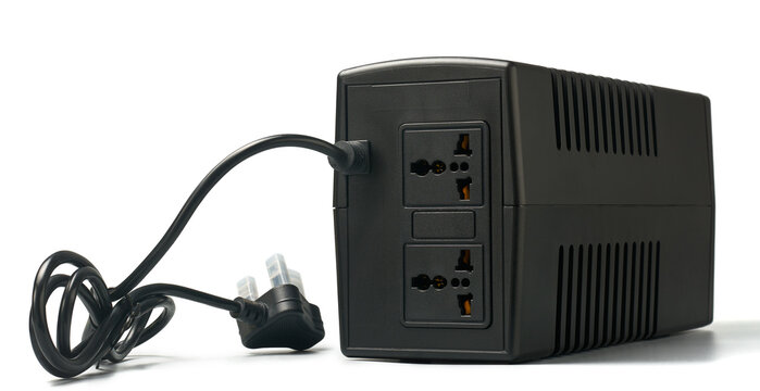 black ups with dual power sockets and coiled power plug isolated white background, side view of uninterrupted power supply unit