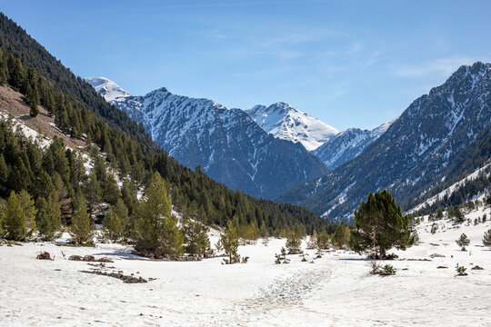 View of the snow-capped Barrosa Valley, Huesca, Aragon, Spain, on a spring day