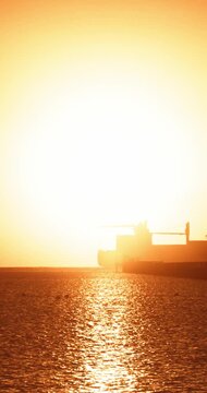 Cargo Ship Timelapse at Cinematic Golden Sunrise | T1.8 Lens, 4K, 12-Bit Braw HQ Vertical Video