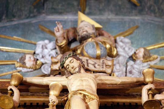 Saint Maurice church.  Baroque altarpiece. 18th century.  Jesus on the cross.   Thones. France.
