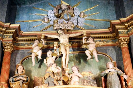 Saint Maurice church.  Baroque altarpiece. 18th century.  God the father and Jesus on the cross.   Thones. France.