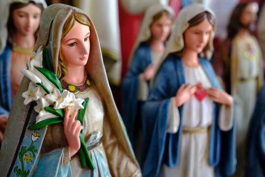 Statues of the Virgin Mary for sale in a religious goods store. Ho Chi Minh city. Vietnam.