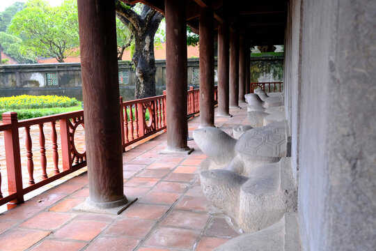 Temple of literature. Long row of stone tortoises supporting engraved doctoral stelae.  Hanoi. Vietnam.