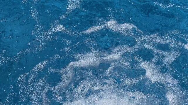 Energetic bubbling pool water in constant motion