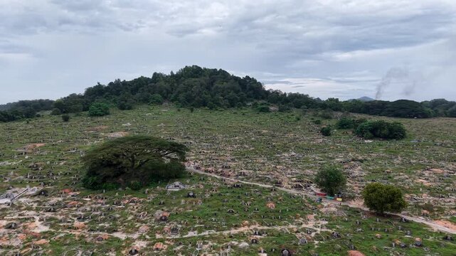 Aerial view of Chinese cemetery Penanti hillside tombs
