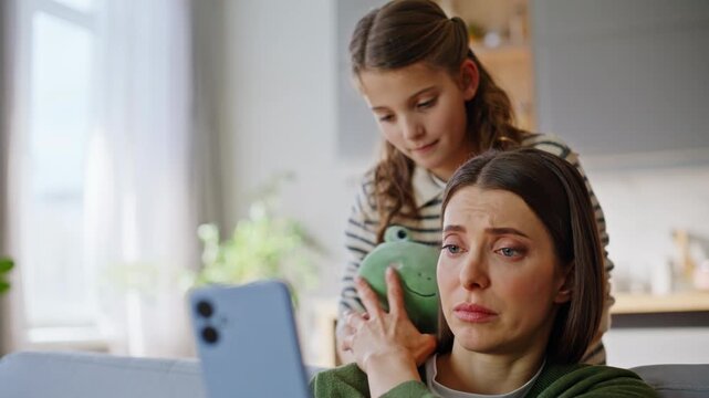 Mother freelancer feeling distracted reacting kid closeup. Child distracting mom