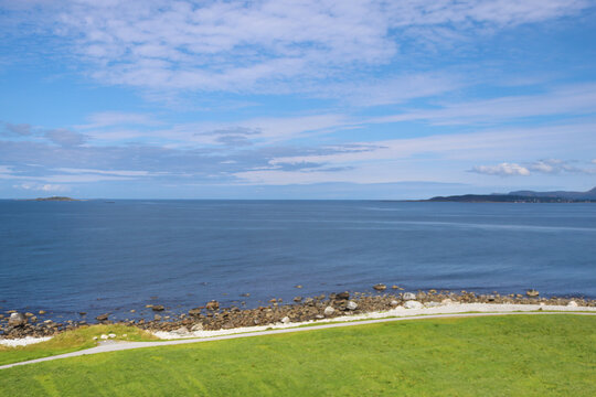 View of the Atlantic Ocean and coastline from Alnes lighthouse, Alnes island, Norway
