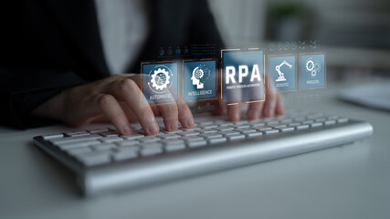 Business Professional Engaging with Robotic Process Automation Interface on Computer Keyboard with...