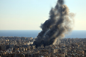 Fototapeta premium Smoke Billows After Israeli Strike on Southern Suburbs City Ruined