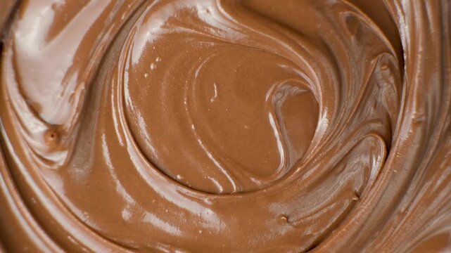 Creamy delicious chocolate melted cream texture background top view