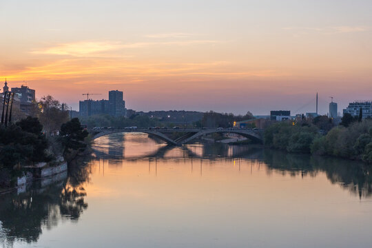 Puente de Santiago, Santiago Bridge in Zaragoza with Ebro river, Sunset, Spain