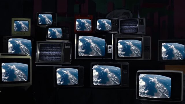 Satellite View of Italy on Stack of Vintage 80s Televisions, Retro Media Wall, Elements of this Video Furnished by NASA - 4K