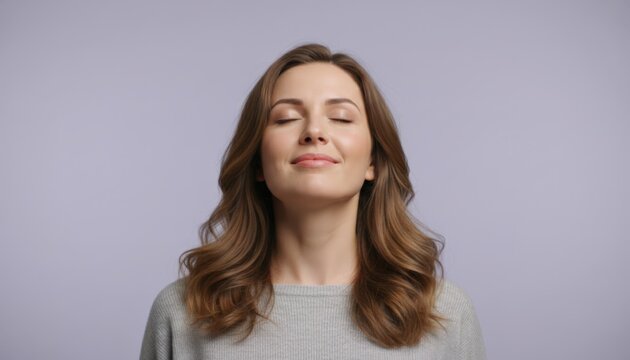 Calm Woman Meditating, Serene Woman Practicing Deep Breathing, Peaceful Woman Closing Eyes For Focused Meditation, Woman With Eyes Shut Performing Tranquil Meditation And Breathing Exercises