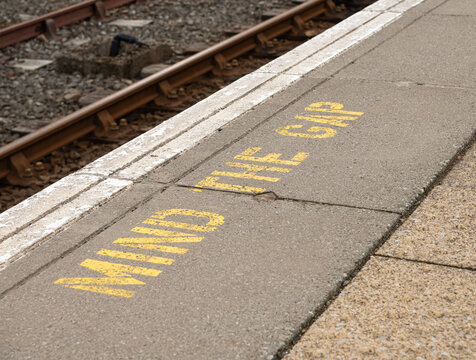Mind the Gap warning on the edge of the Platform at Thurso Railway Station, Scottish Highlands,  Caithness,  Scotland, UK