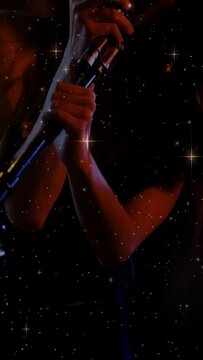 Vertical video: Camera moving in, singer gripping retro mic performing music with star overlay