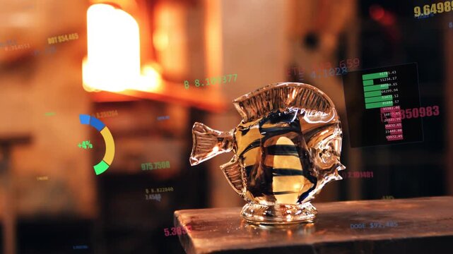 Camera racking focus toward glass fish in glass studio, HUD circling sculpture for review