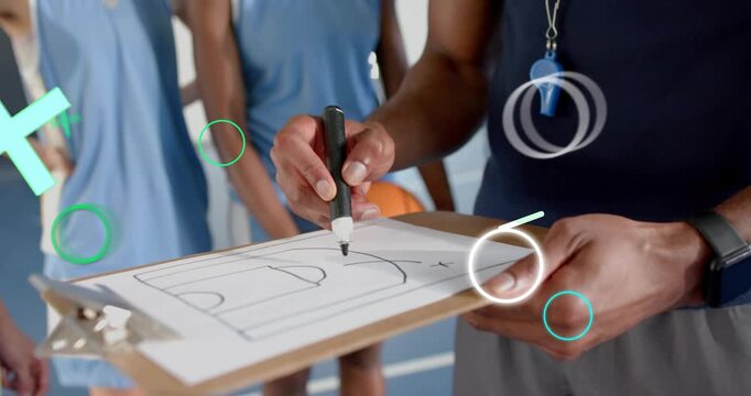 Coach grabbing marker and drawing court diagram during practice, teal graphics highlighting tactics
