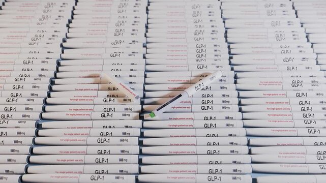 3d rendered image of a large collections of glucagon like peptide 1 or GLP-1 injection pens.