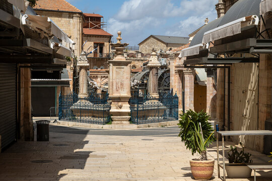 Jerusalem, Israel, April 4, 2026, scenic view of a public square in the old city with stone buildings and decorative monuments. The Muristan Fountain, located in the Christian Quarter of the Old City