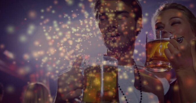 Male-female pair toasting mugs, sparkle overlay sweeping, camera pulling back revealing club