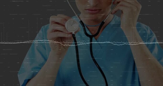 Placing earpiece, clinician in scrubs rotating stethoscope in clinic checking heart, with waveform