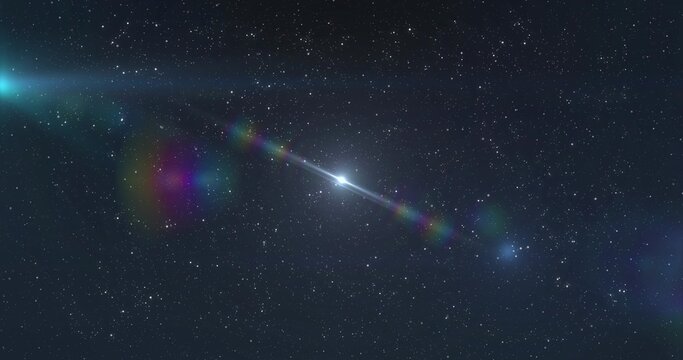 Cutting meteor with core streaking across open night sky, with rainbow halos, lens flares and stars