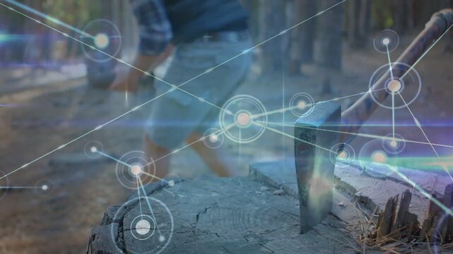 Man approaching stump with axe head at camp, picking up sledge and activating HUD, preparing wood