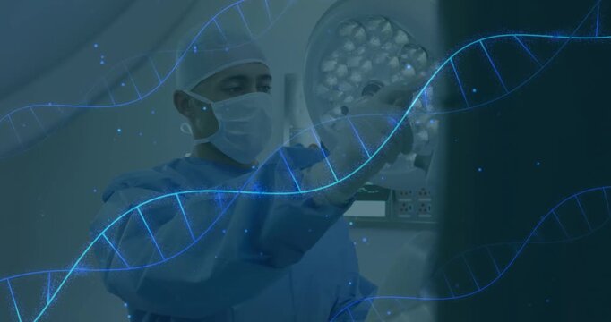 Surgeon reaching upward, adjusting lamp for surgery while animated DNA helix drifting across front