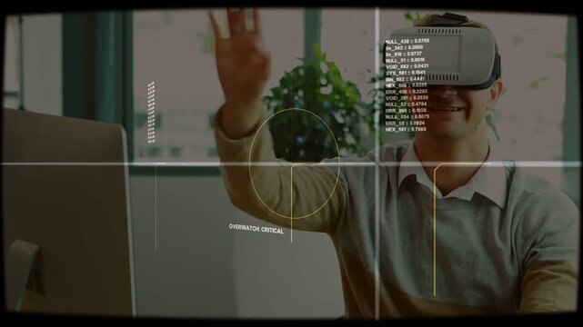 Man wearing VR headset raising right hand manipulating HUD reticle with OVERWATCH CRITICAL testing