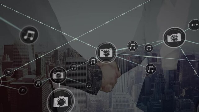 Animation of network of connections with icons over people shaking hands