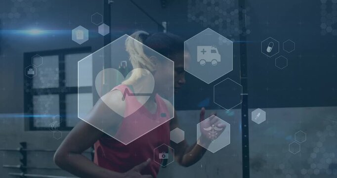 Animation of medical and health icons over caucasian woman exercising in gym