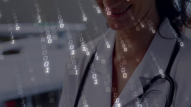 Female MD tapping tablet, initiating binary overlay while checking charts, lifting head smiling