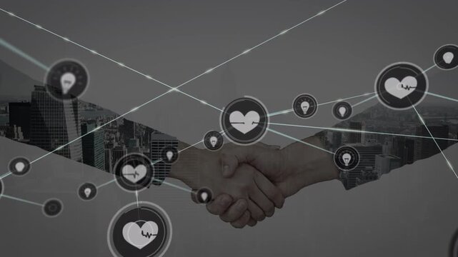 Animation of network of connections with icons over people shaking hands