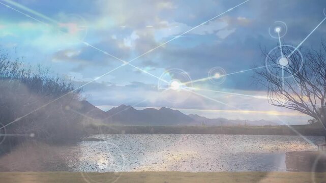 Single luminous node appearing near sunrise emitting lines growing network overlay over shoreline
