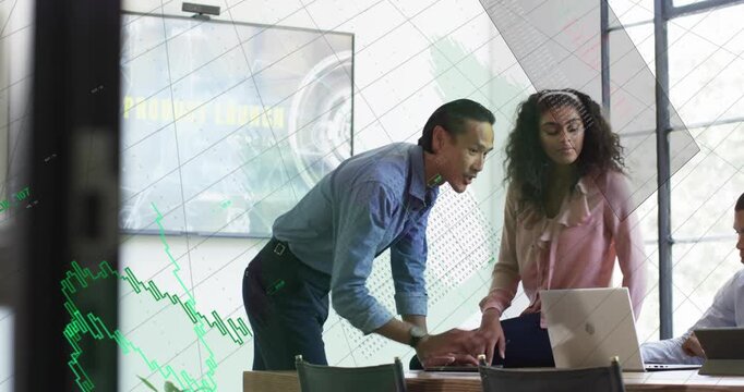 Vertical video: Approaching man holding phone, tapping laptop at office, reviewing graph, in shirts