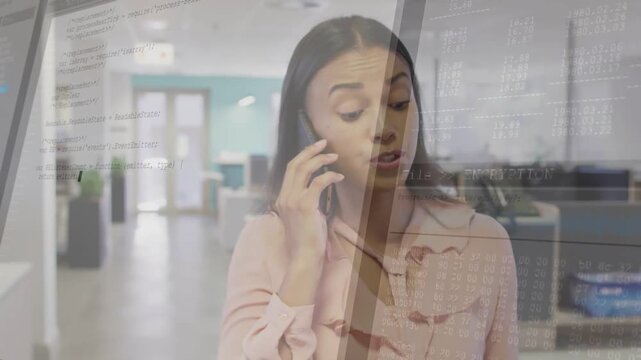 Female office rep on incoming call reviewing docs, code overlay fading over her confirming numbers