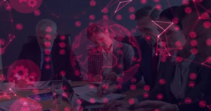 Pink data overlay drifting, five business pros leaning, writing and consulting tablets and charts