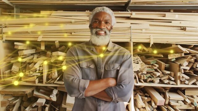 Senior carpenter facing camera yellow nodes and lines entering left sweeping to chest showing craft