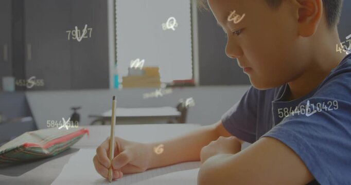 Writing student blue tee holding pencil on paper at school desk with animated overlay, copy space