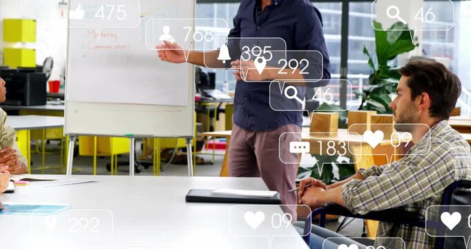 Presenter pointing at flip chart while colleague raising hand causing metrics overlay for business