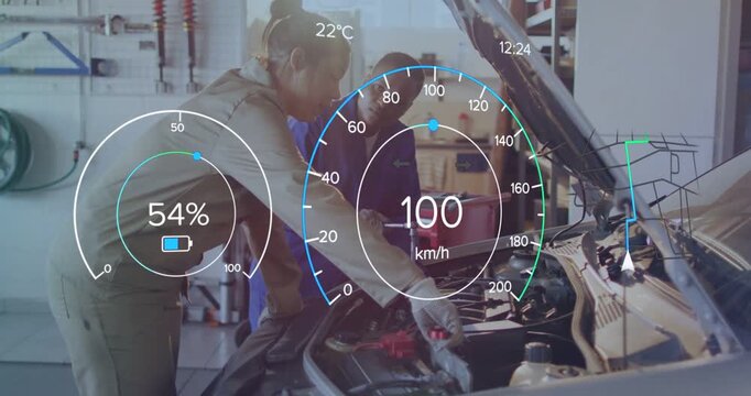 Two techs leaning over open hood with HUD overlay appearing attaching red clamp testing speed