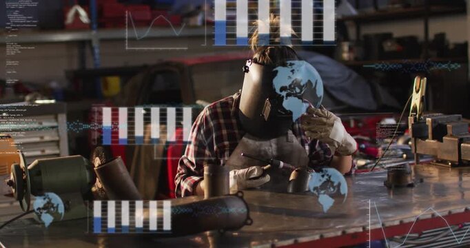 Woman welder lowering helmet and striking torch, welding metal parts while HUD charts appearing
