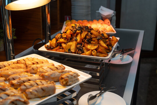 Professional catering buffet featuring grilled chicken