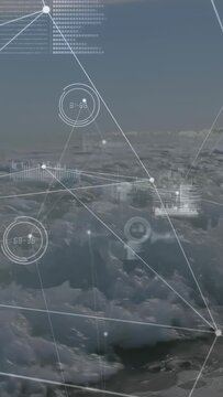 Vertical video: Cam pulling back over foam shore, HUD expanding gauges, nodes, bars for ocean tech