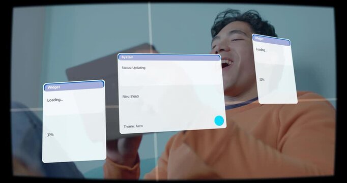 Vertical video: Man tapping tablet on sofa with 3 widgets appearing, monitoring system update pct