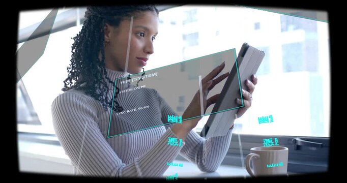 Adult female holding tablet upright and tapping, using translucent HUD panels monitoring tech sync