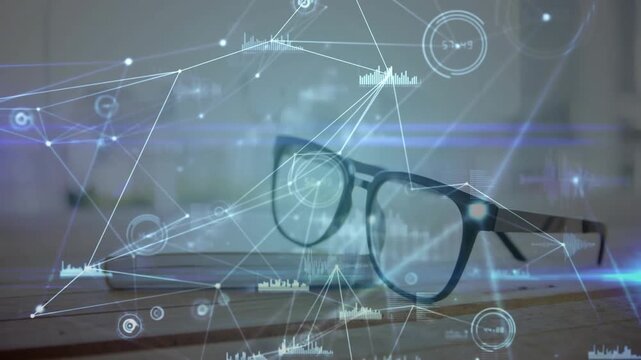 Vertical video: Blue HUD appearing nodes forming streaks sweeping over glasses resting showing data